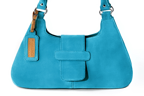 Dressy shoulder bag in turquoise blue leather - Profile view